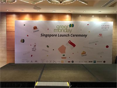 Printed stage backdrop wall for a corporate product launch ceremony