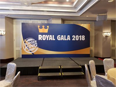 Burger King printed stage backdrop set up for an awards gala