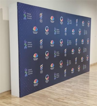Large format printed backdrop wall standing in a room